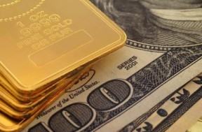 Gold-bars-on-100-and-50-dollar-bill